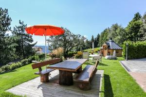 Vonkajšia záhrada v ubytovaní Alps Residence