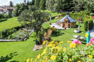 Vonkajšia záhrada v ubytovaní Alps Residence