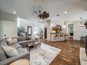 a living room with a couch and a table at Shady Shores Lake House - Hot Tub Dog-Friendly in Shady Shores