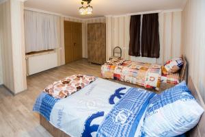 Кровать или кровати в номере Apartamenti Gomi 17