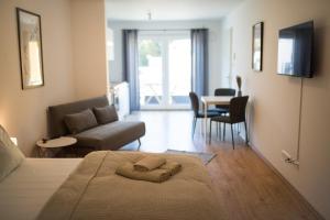 Posezení v ubytování HUGOS Studio Apartment