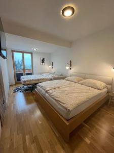 Postel nebo postele na pokoji v ubytování Slunečný apartmán