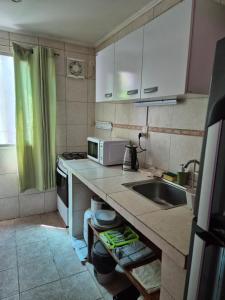 Kuchyň nebo kuchyňský kout v ubytování Paysandu apartamento céntrico