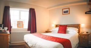Ένα ή περισσότερα κρεβάτια σε δωμάτιο στο Mill Croft Bed and Breakfast