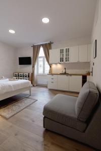 Ένα ή περισσότερα κρεβάτια σε δωμάτιο στο Place 2 stay Zagreb