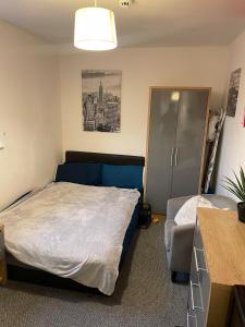 เตียงในห้องที่ City Rooms by Capital Pads