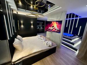 Una cama o camas en una habitación de Masarska 6 VIP Apartamenty JACUZZI 10 fotos más