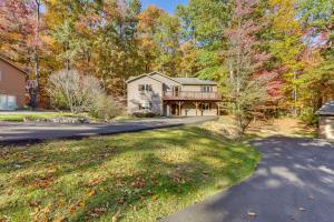 a home in the woods with a driveway at Home Less Than 2 Mi to Mtn Greens Golf, Massanutten Ski! in McGaheysville