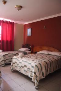 Krevet ili kreveti u jedinici u objektu Hotel Toledo