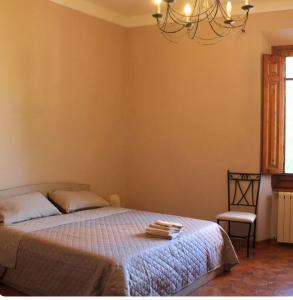 Postel nebo postele na pokoji v ubytování La Divina guest house