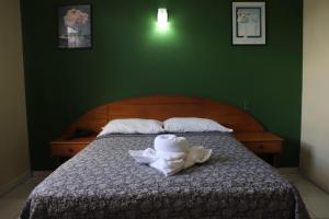 Krevet ili kreveti u jedinici u objektu Hotel Toledo