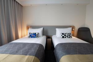 Holiday Inn Express - Arcachon - La Teste by IHG客房内的一张或多张床位