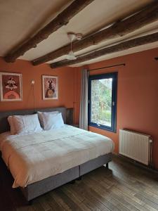 Postel nebo postele na pokoji v ubytování Buteo chambres d'hôtes & espresso