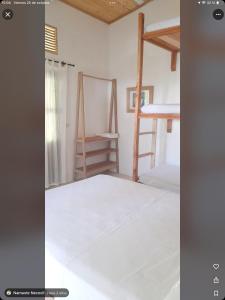 Postel nebo postele na pokoji v ubytování Namaste cabaña 02