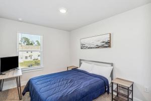 Postel nebo postele na pokoji v ubytování LUXURY TOWNHOME NEAR DOWNTOWN AND PENSACOLA BEACH + 27 fotografií