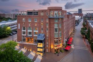 an overhead view of a brick building on a city street at The Alida, Savannah, a Tribute Portfolio Hotel in Savannah