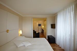 Krevet ili kreveti u jedinici u okviru objekta Hotel des Balances