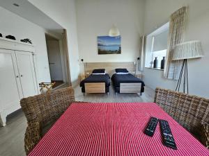Ένα ή περισσότερα κρεβάτια σε δωμάτιο στο Bed & Breakfast Boekel