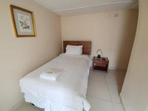 Giường trong phòng chung tại Hostal Sevilla Temuco +6 ảnh