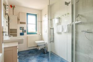 Koupelna v ubytování Trumhus + 24 fotografií