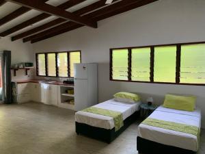 Postel nebo postele na pokoji v ubytování Turtle Bay Beach House