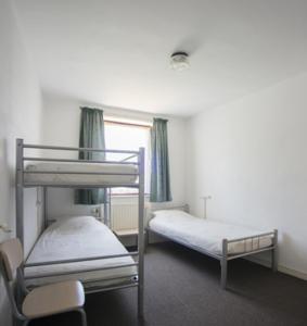 Vakantie oord Zonnehoeve emeletes ágyai egy szobában