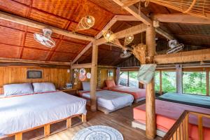Postel nebo postele na pokoji v ubytování Toce House Tả van