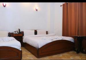 Hotel Siddhartha in Lumbini客房内的一张或多张床位