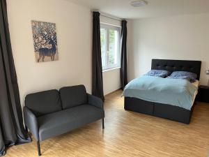 Postel nebo postele na pokoji v ubytování Art Apart Stuttgart