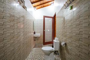 Ένα μπάνιο στο JJ HOME BALI GUEST HOUSE +37 φωτογραφίες