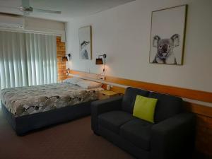 Postel nebo postele na pokoji v ubytování Shelly Beach Motel