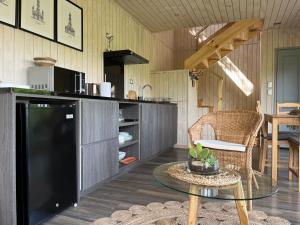 Kuchyň nebo kuchyňský kout v ubytování AncudLodge