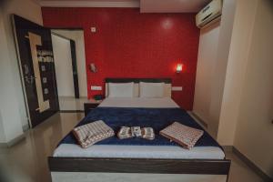 Postel nebo postele na pokoji v ubytování Hotel Mahabaleshwar Mount View