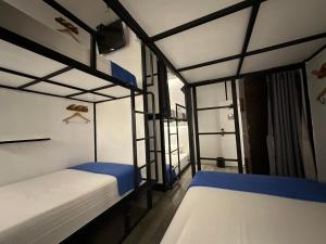 Postel nebo postele na pokoji v ubytování Surf Hostel Krabi