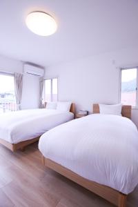81 Guest House -ANKI-にあるベッド