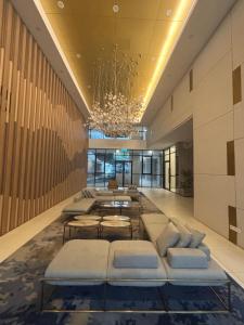 Posezení v ubytování Skytrees Comfort Room With Simple Design Concept