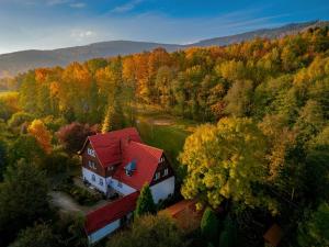 an aerial view of a house with a red roof at Zającówka in Polanica-Zdrój