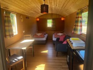 Postel nebo postele na pokoji v ubytování Pipowagen Het Kasteel