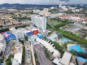 an aerial view of a large city with a amusement park at Luxury DoubleTree Hill10 Residence at i-City , free parking H2901 in Shah Alam