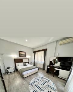 Postel nebo postele na pokoji v ubytování Çimenler otel
