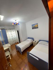 Letto o letti in una camera di Hotel Kalaja