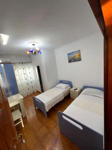Letto o letti in una camera di Hotel Kalaja