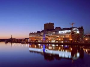 a view of a city at night with a body of water at Hotel Axia Inn Kushiro - Vacation STAY 67227v in Irifunechō +14 photos