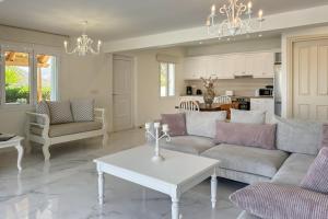 A kitchen or kitchenette at Pano Stalos Villas