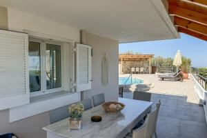 The swimming pool at or close to Pano Stalos Villas