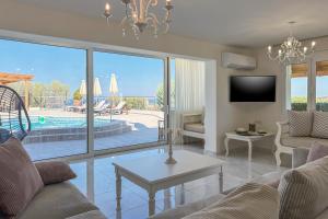 A television and/or entertainment centre at Pano Stalos Villas