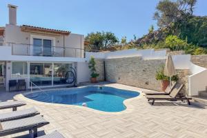 The swimming pool at or close to Pano Stalos Villas