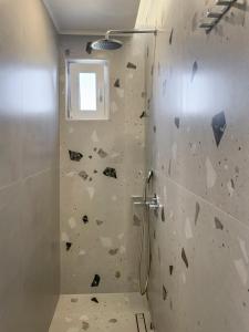 A bathroom at Pano Stalos Villas