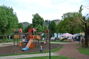 a park with a playground with a slide at Appartment Bürger-Hinteregger in Seeboden