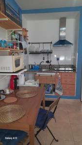 Kuchyň nebo kuchyňský kout v ubytování Los Abrigos 2 apartments Guest House Ocean relax, wifi, playas